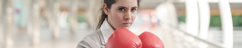 professional woman with boxing gloves on