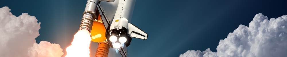 space shuttle launching into orbit